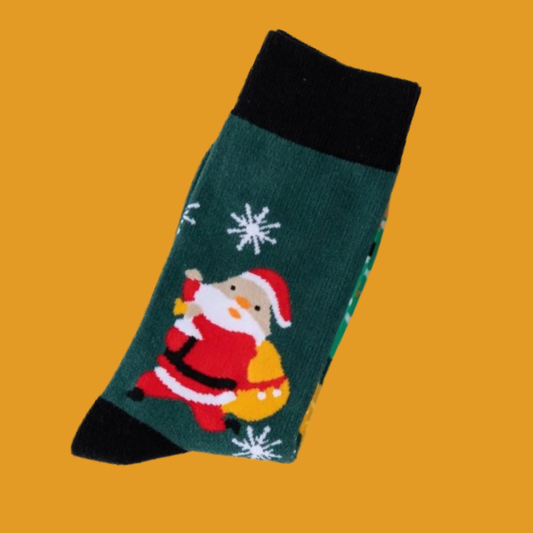 Christmas-themed sock with Santa Claus design on a mustard yellow background
