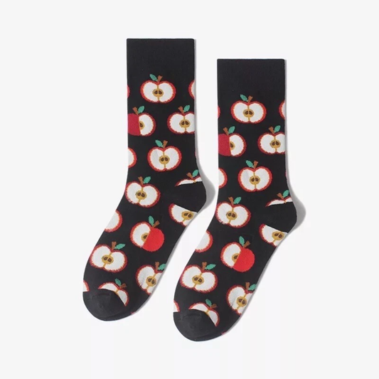 Black socks with red apple pattern on a white background