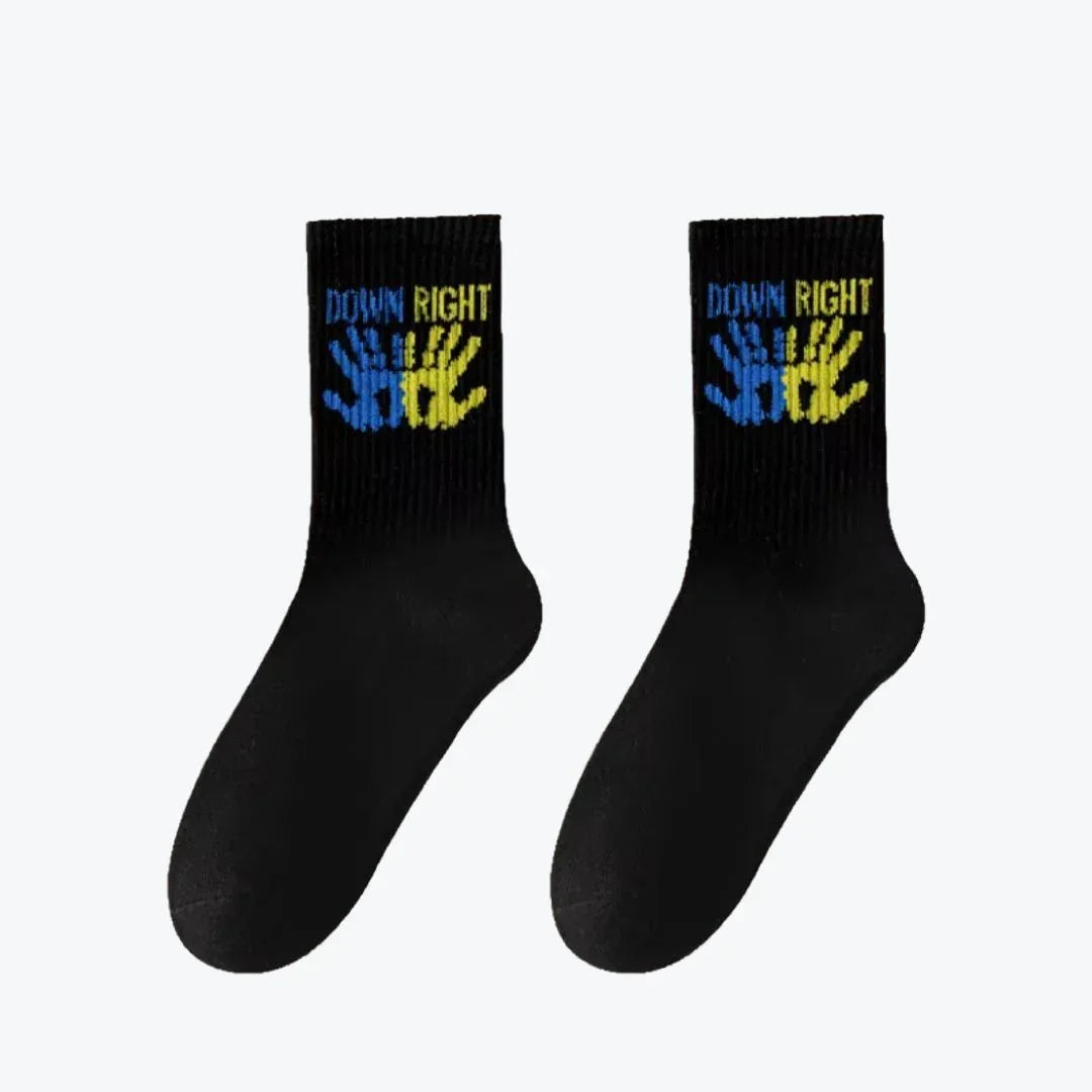 Black socks with colorful text and hand symbols 