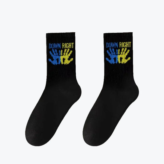 Black socks with colorful text and hand symbols 