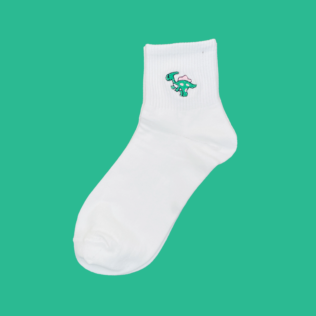 White sock with a green and red logo on a green background