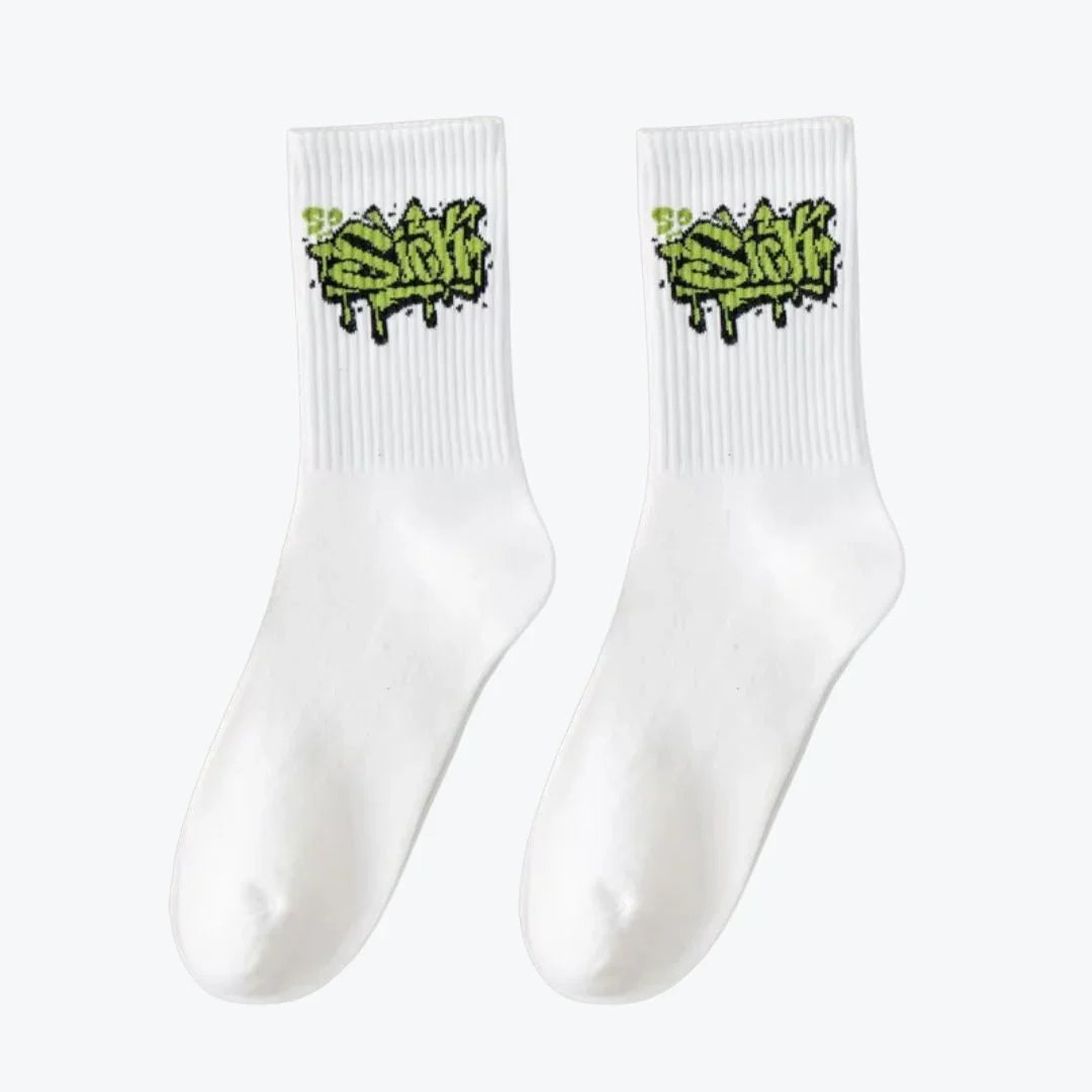 White socks with green graffiti-style logo