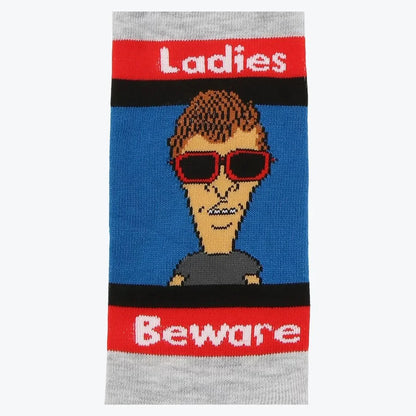 Sock with a graphic of a person wearing sunglasses and text 'Ladies Beware'