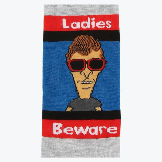 Sock with a graphic of a person wearing sunglasses and text 'Ladies Beware'