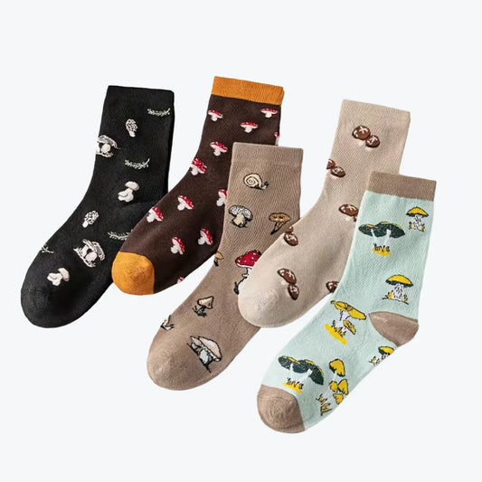 Set of five socks with mushroom patterns on a white background
