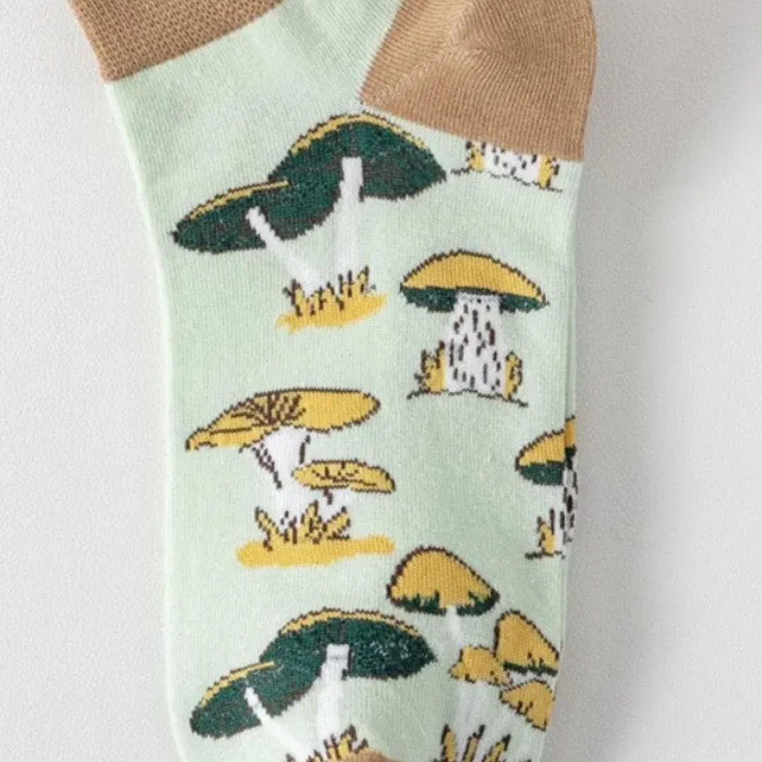 Sock with mushroom pattern on a light green background