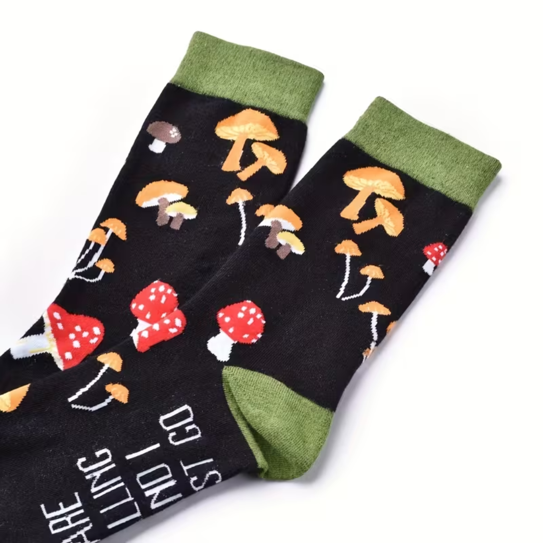 Pair of socks with mushroom pattern on a white background