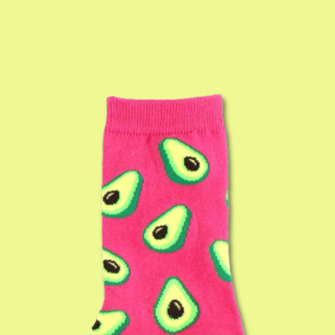 Pink sock with avocado pattern on a yellow background