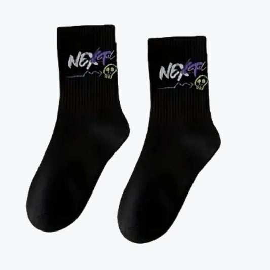Pair of black socks with 'NEXT' 