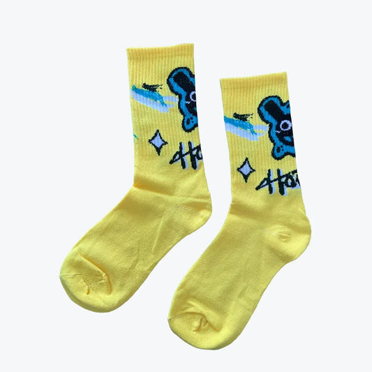Yellow socks with blue and black designs