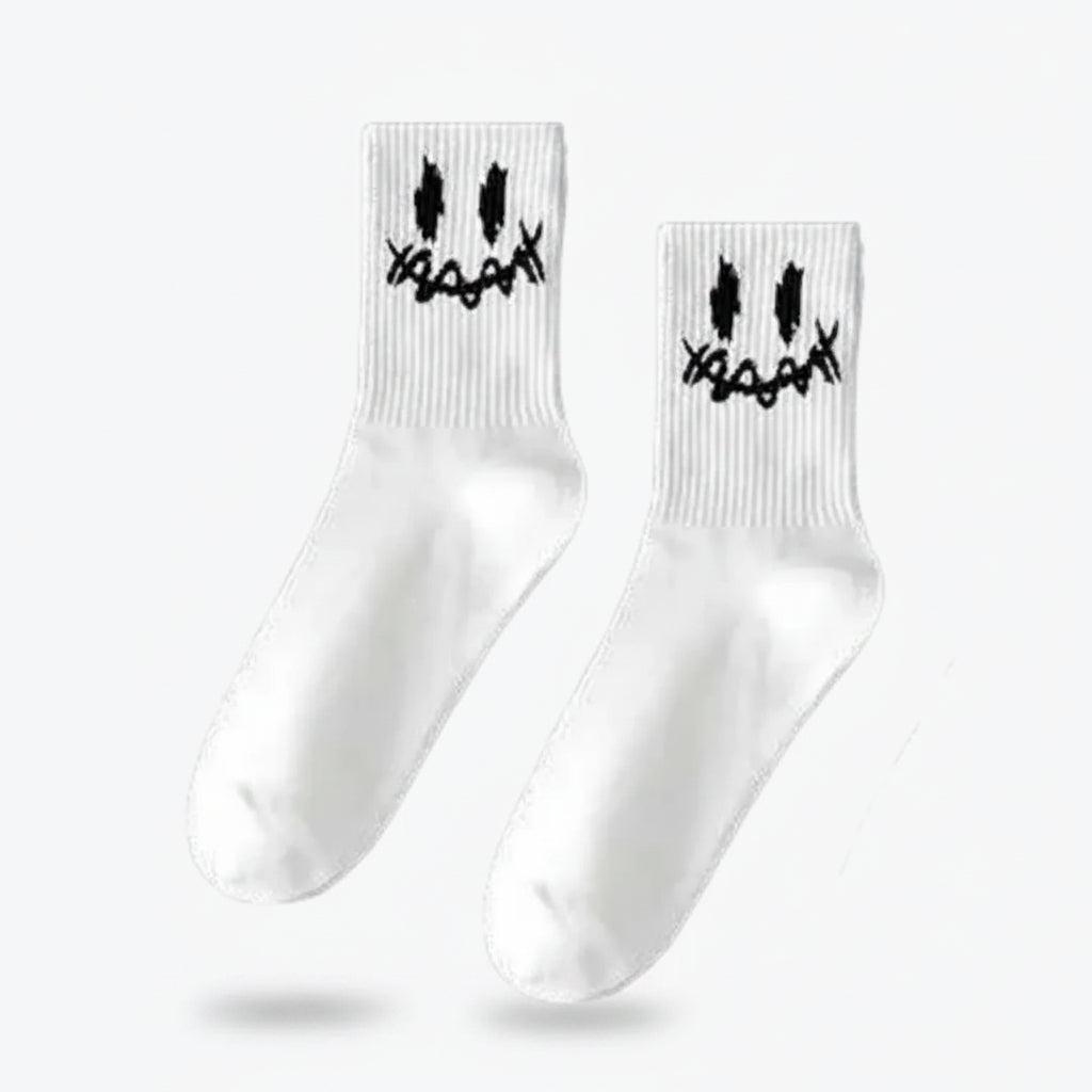 White socks with black designs on a white background