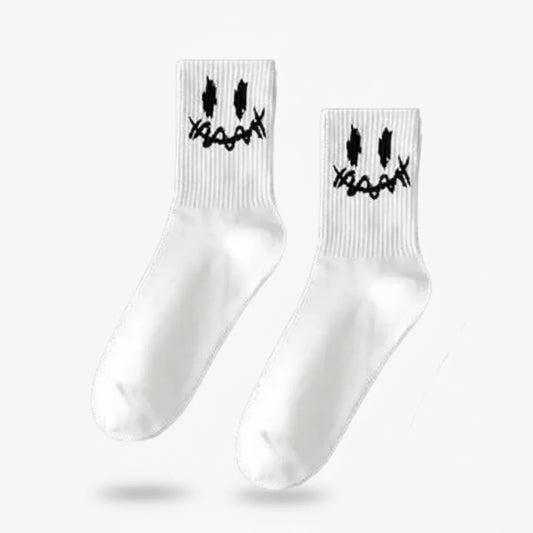 White socks with black designs on a white background