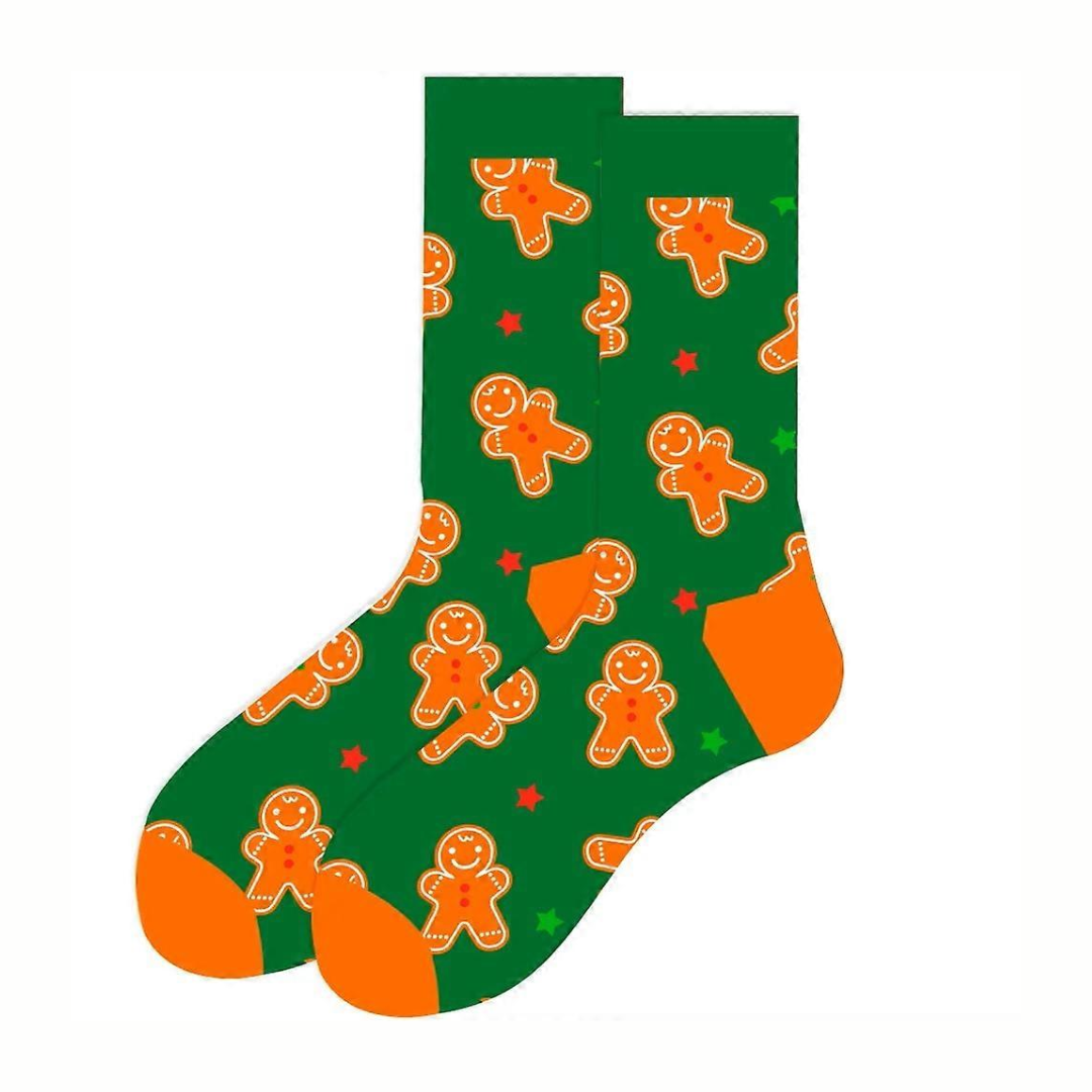 Green sock with orange gingerbread man pattern on a white background