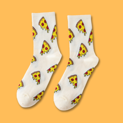 White socks with pizza slice pattern on a yellow background